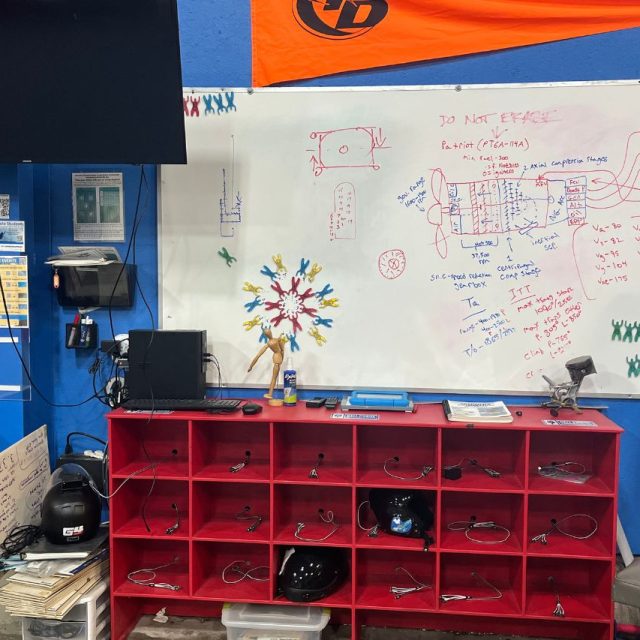 White board with a diagram of the Patriot plane engine in the Start Skydiving hangar