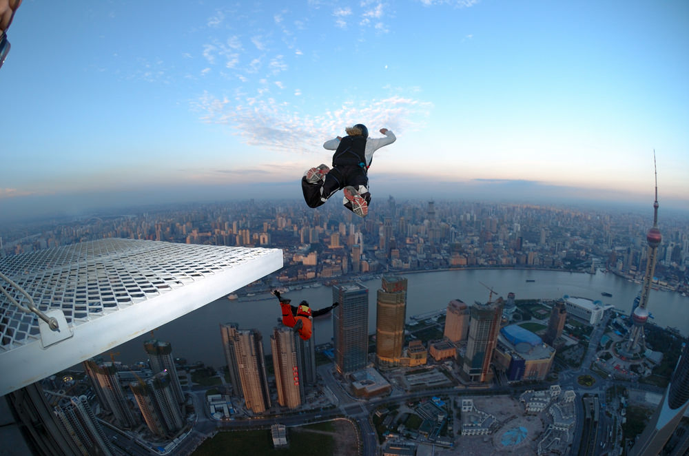 Base Jumper jumping off of a building